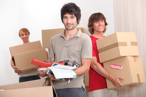 Moving team handling furniture in Streatham