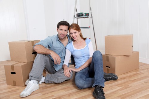 Local removal team loading furniture for a Streatham move