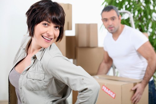 Packed boxes and furniture ready for local van transport