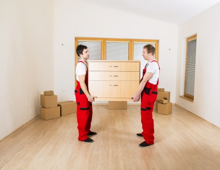 Packed boxes and furniture ready for removal in a Streatham flat
